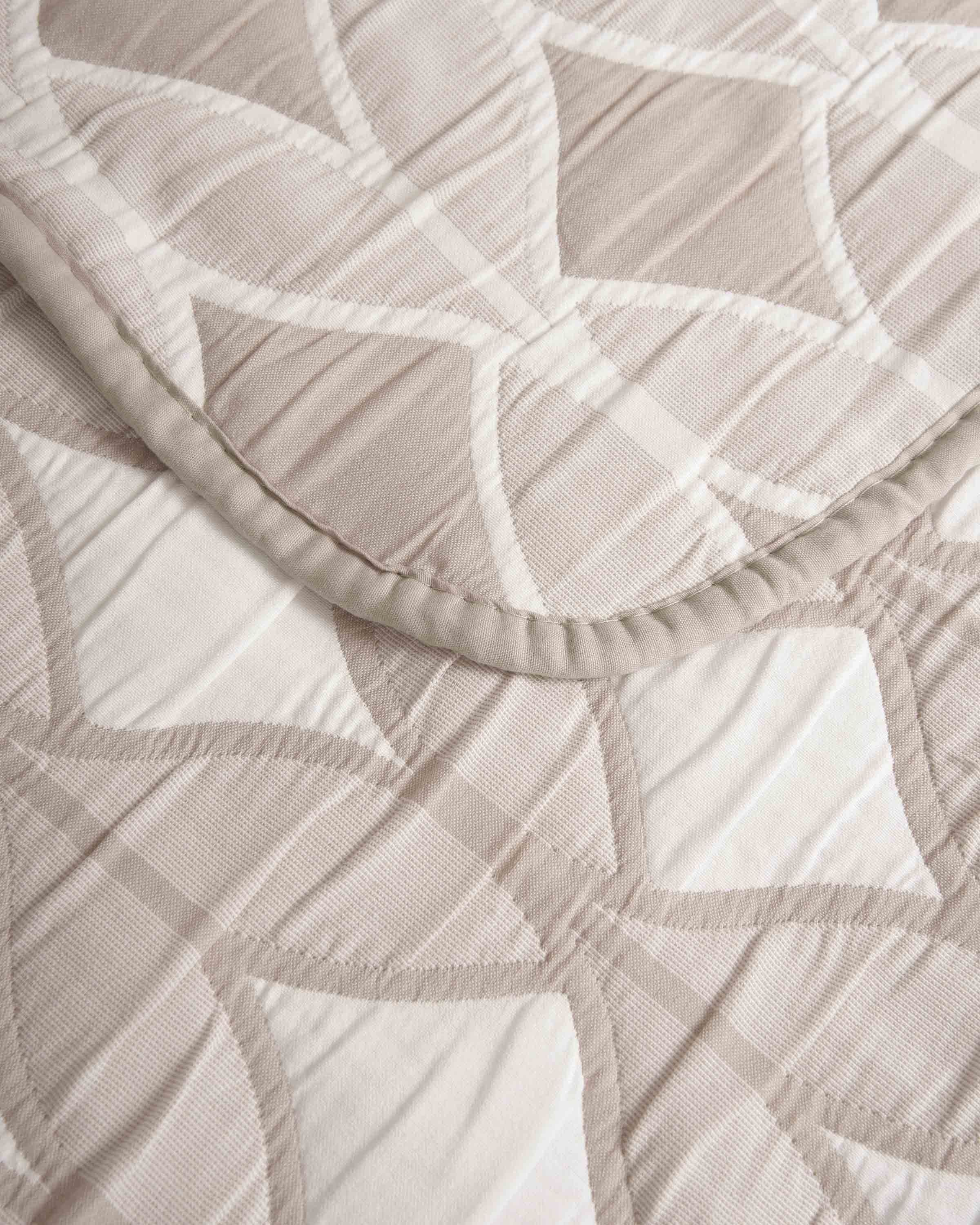 Colcha doble tela jacquard cabot topo