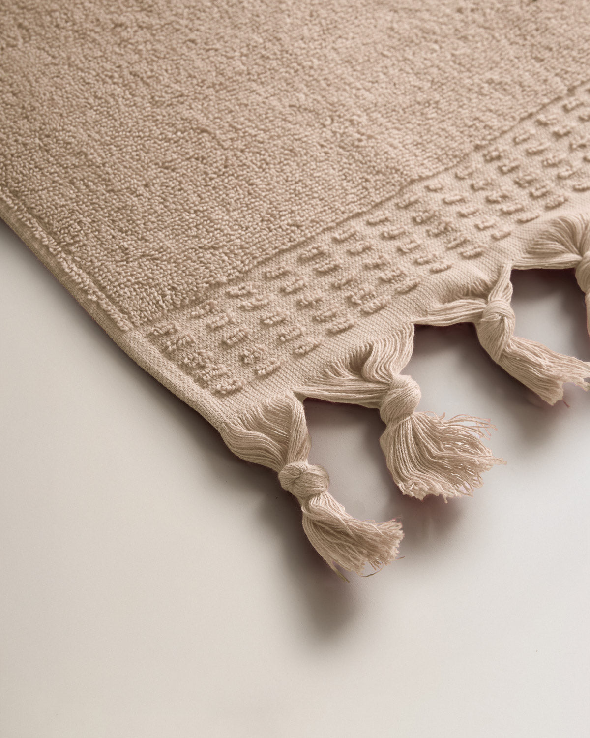 Serviette à franges unie 550 g Taupe