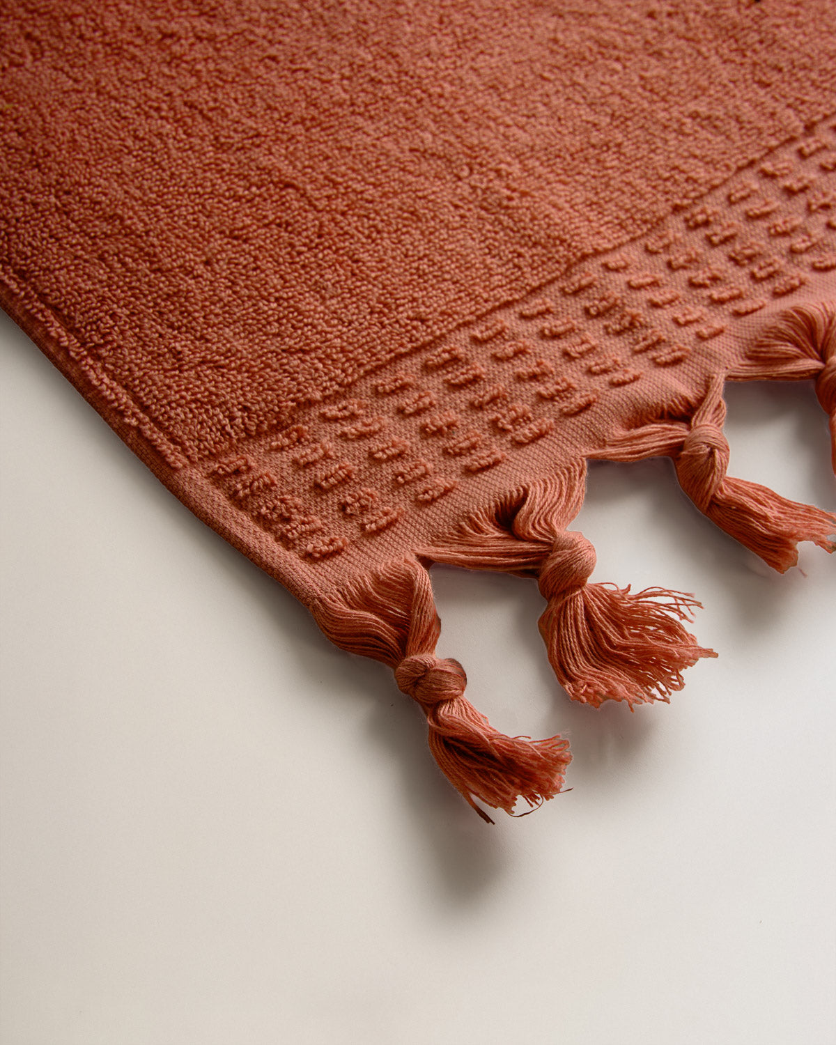 Serviette à franges unie 550 g Caldera