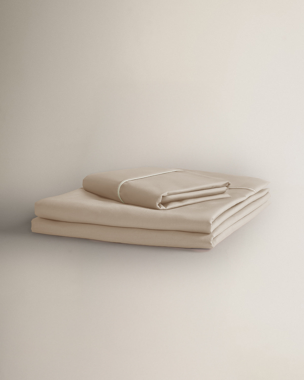 Ensemble de draps en percale de coton avec passepoil taupe