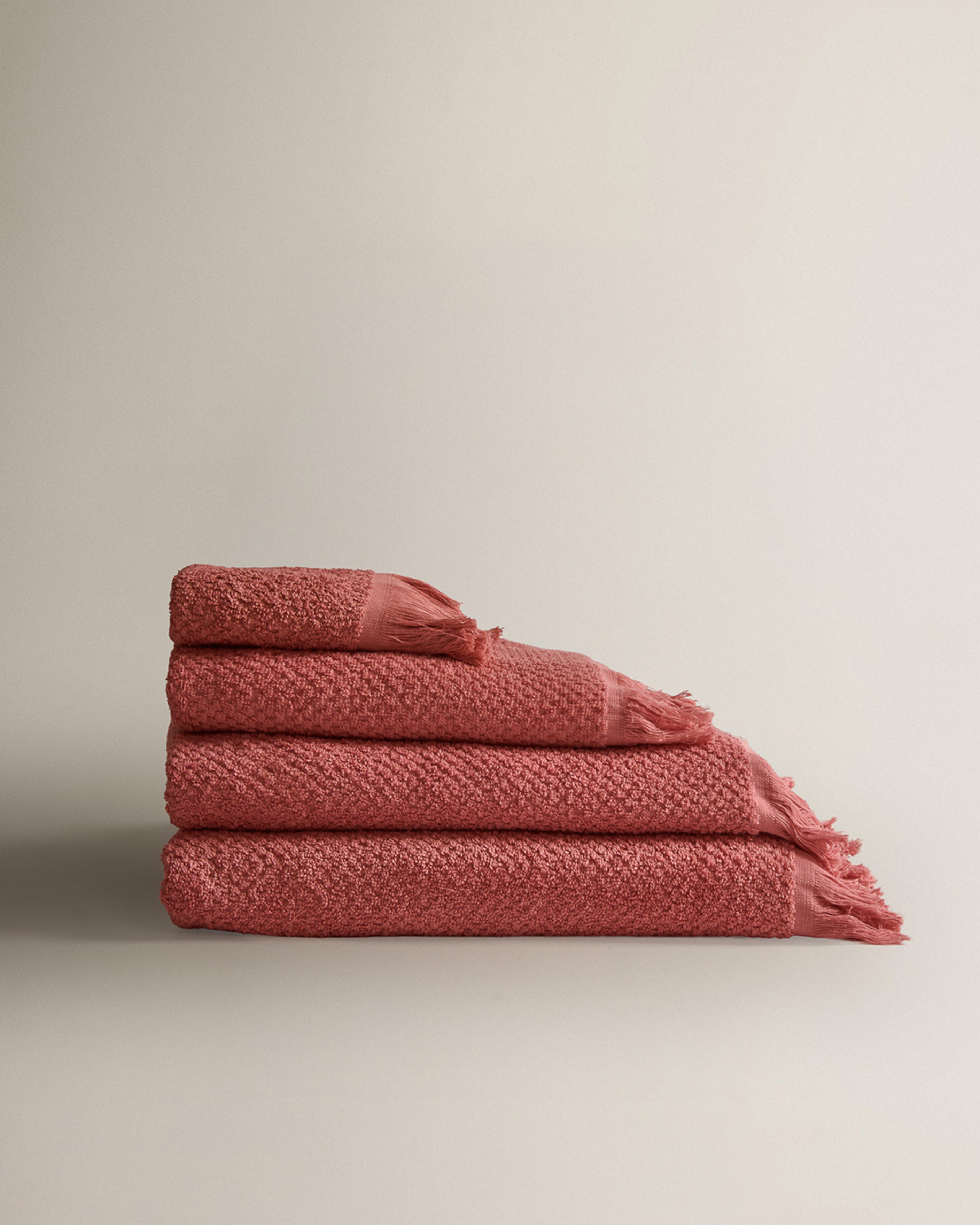 Serviette chenille à franges, unie, 550 g, rosette