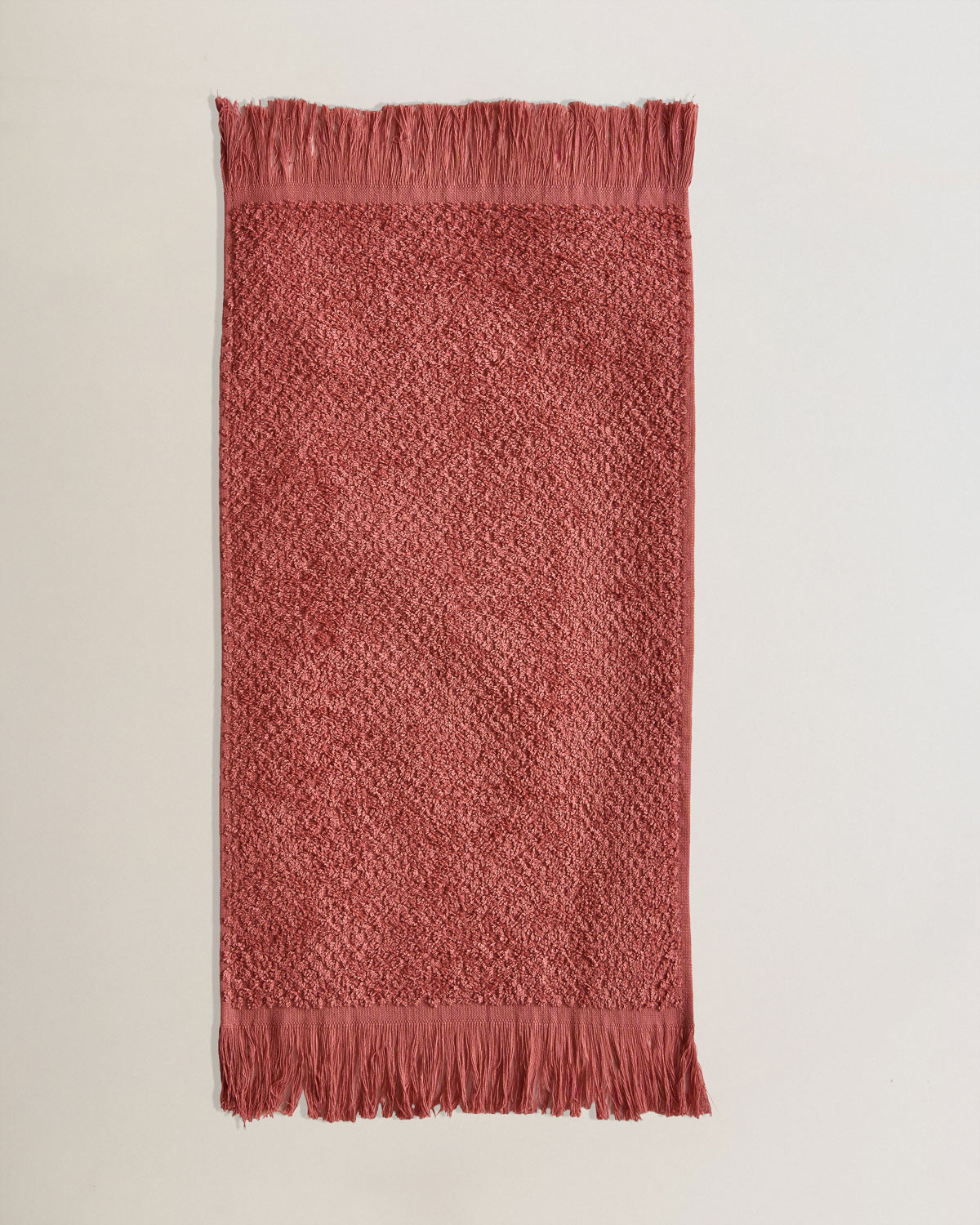 Serviette chenille à franges, unie, 550 g, rosette