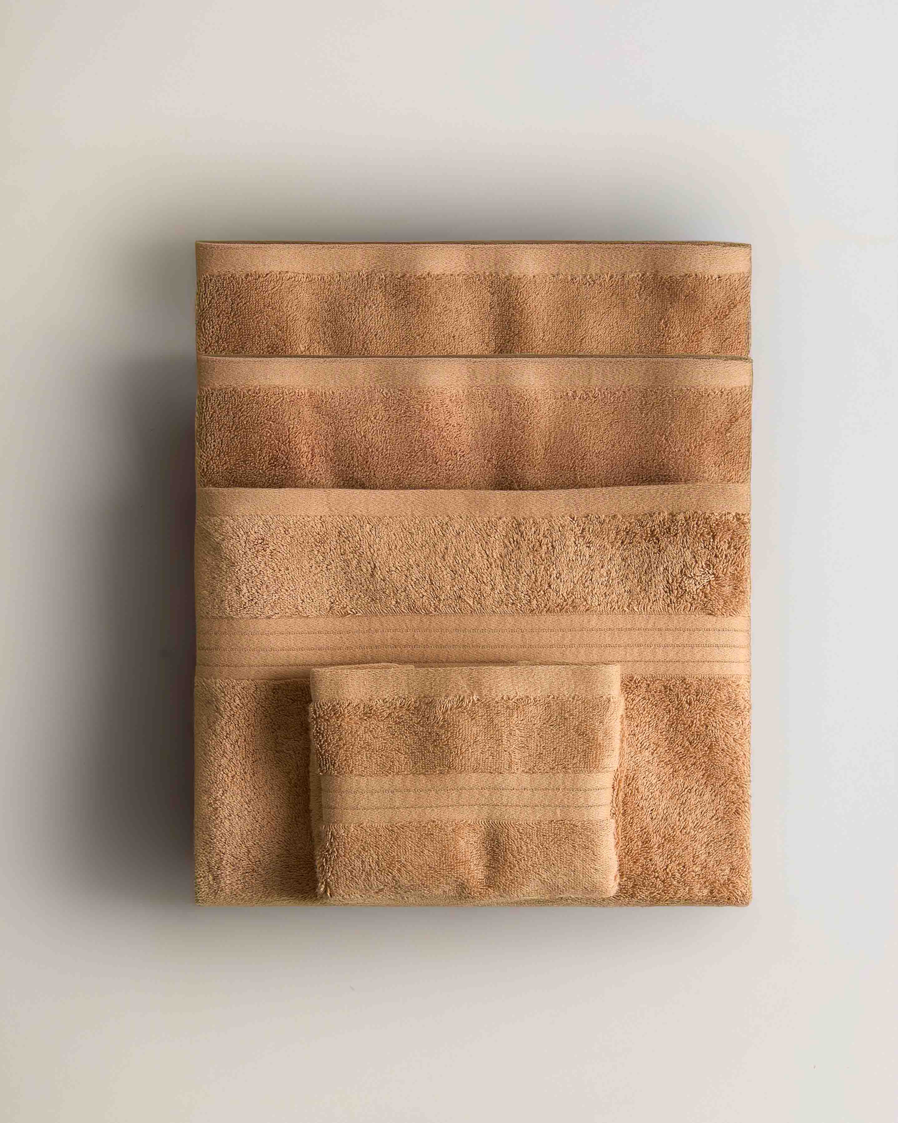 Toalla baño algodón ocre (700 gr/m²)