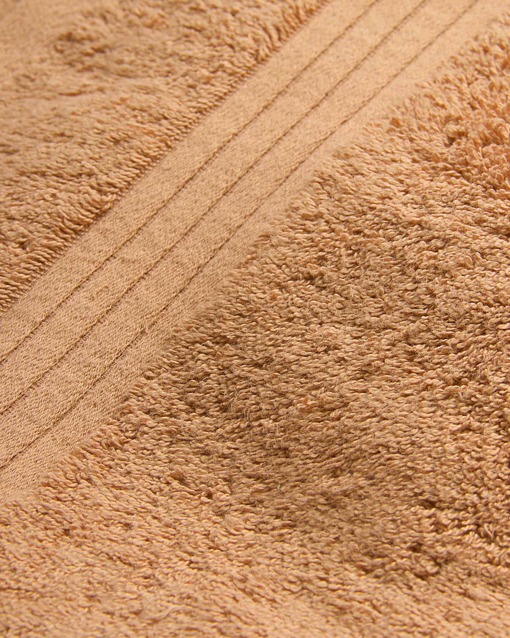 Toalla baño algodón ocre (700 gr/m²)