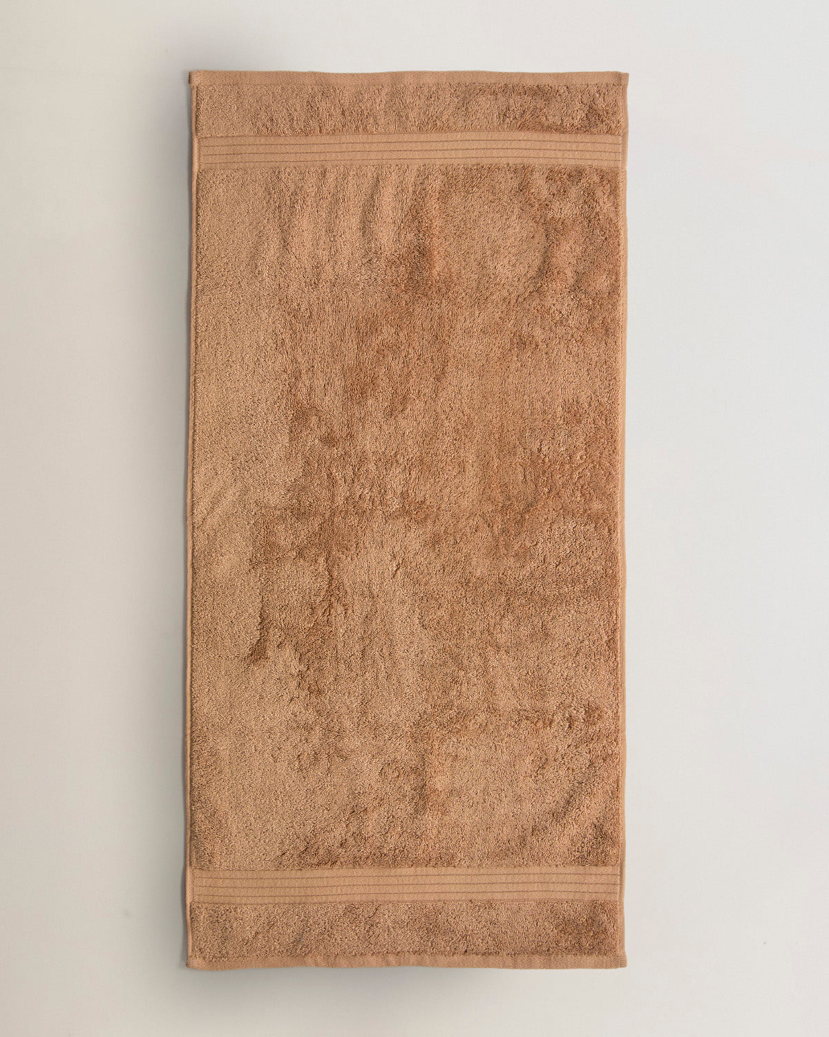 Toalla baño algodón ocre (700 gr/m²)