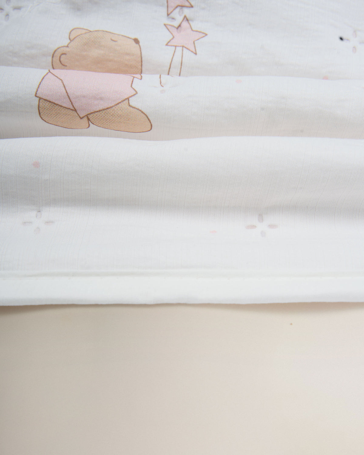 Colcha perforada infantil peluche rosa
