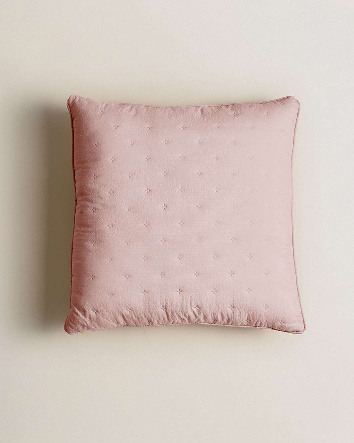 Cojín infantil perforado liso rosa keike