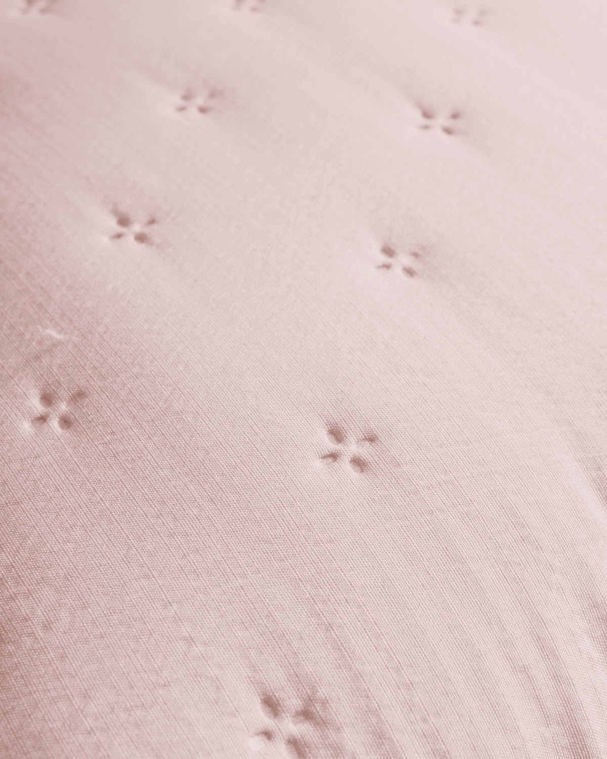 Cojín infantil perforado liso rosa keike