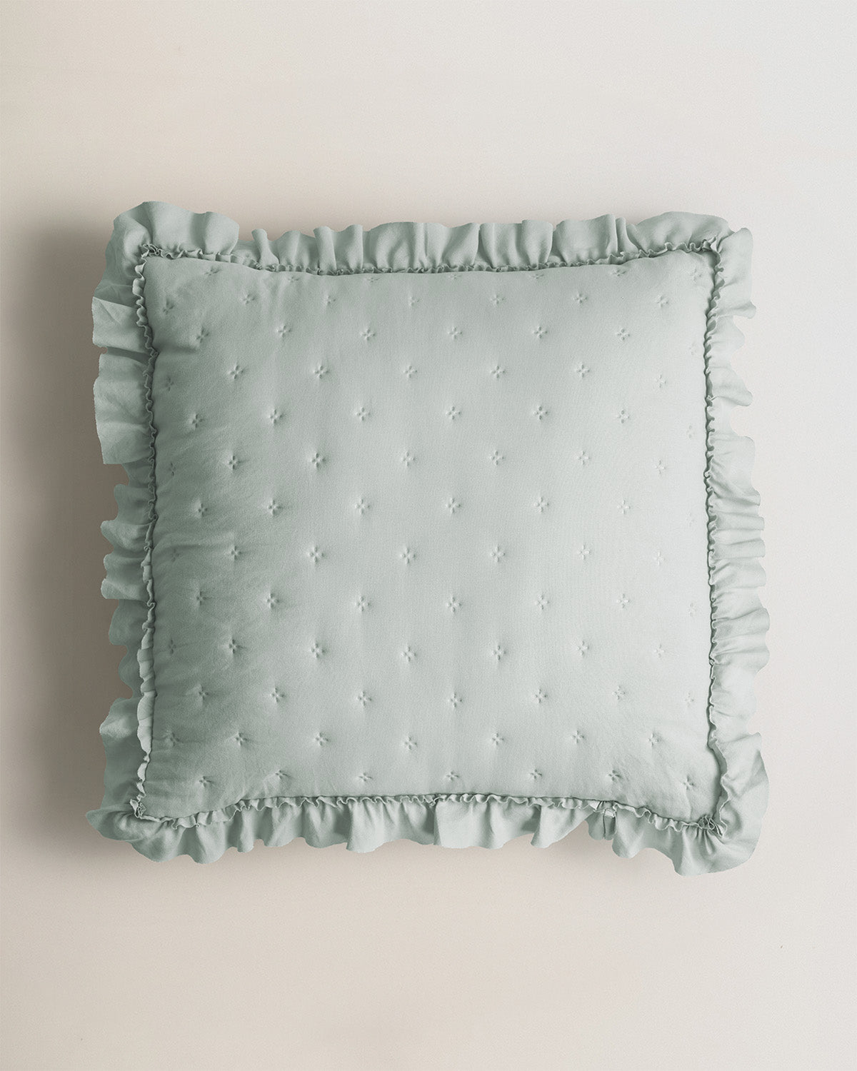Coussin perforé vert uni Keike