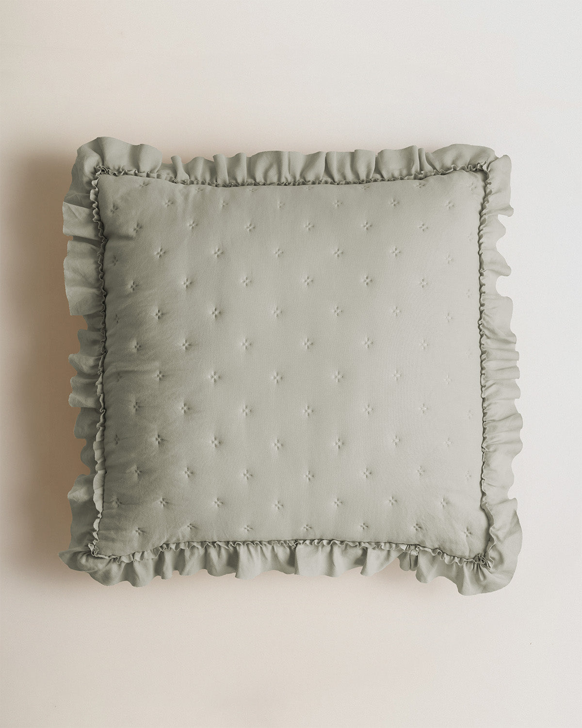 Cuscino perforato verde secco