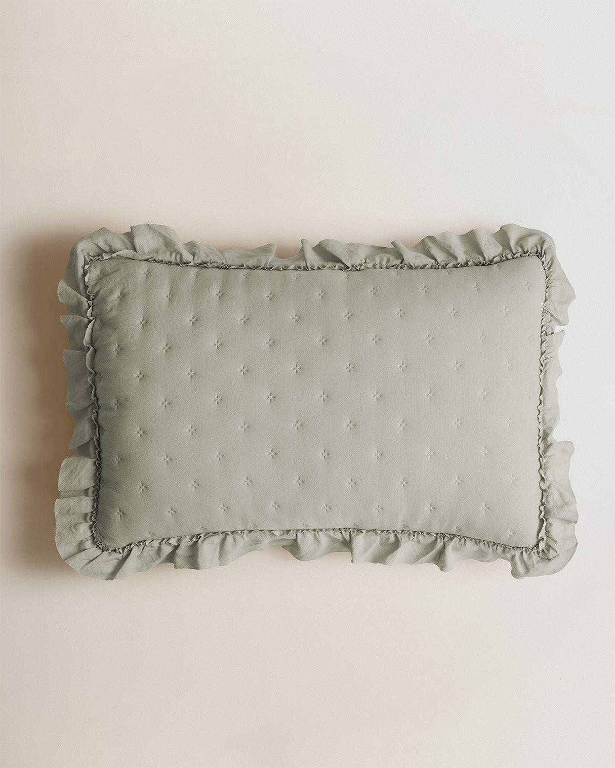 Cuscino perforato verde secco