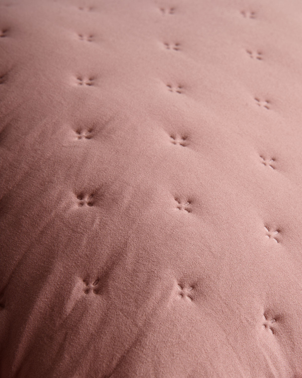 Rosette de coussin perforée simple